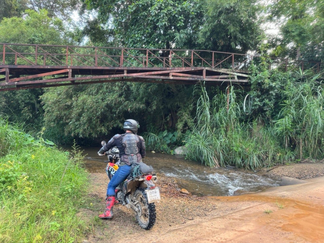 Lining up for the ford under the old footbridge.