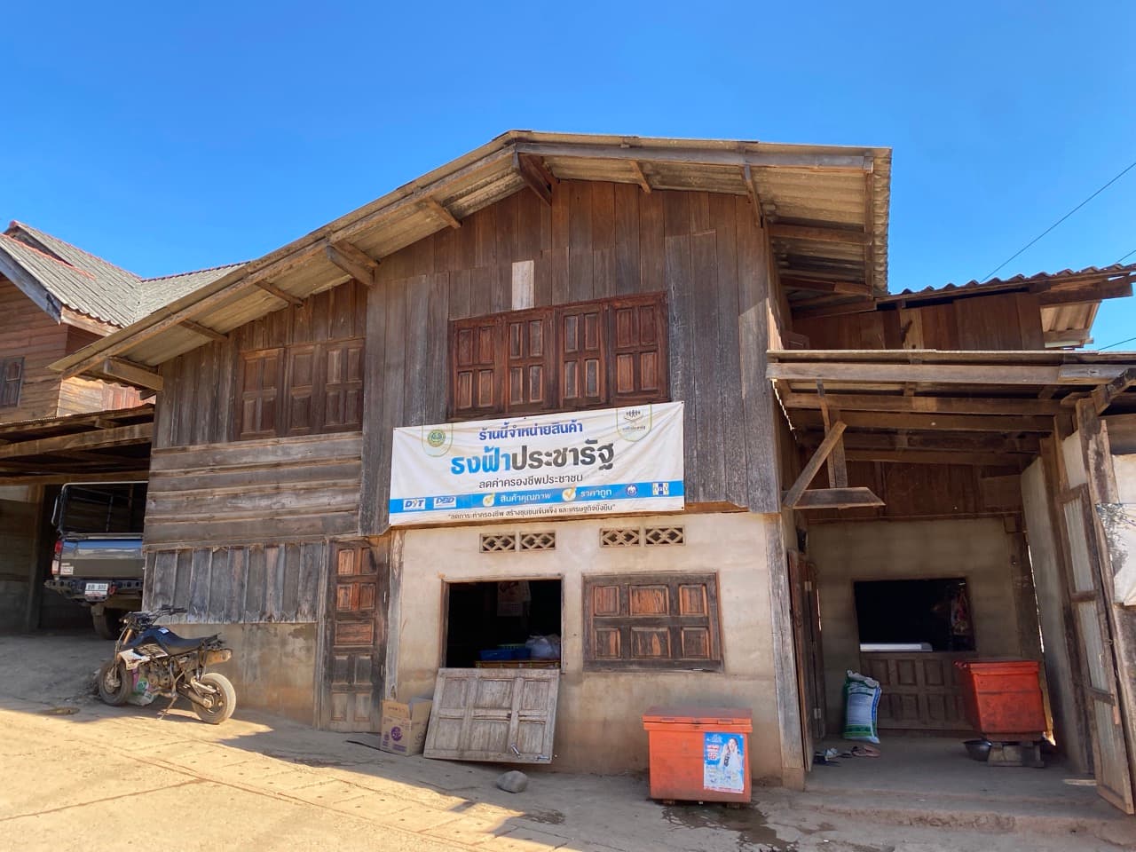 A wooden Karen stilt house in the village we rode through.