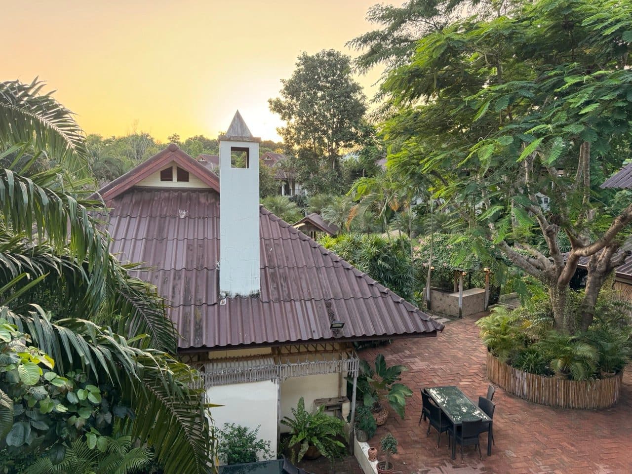 Sunset over the resort roofs.