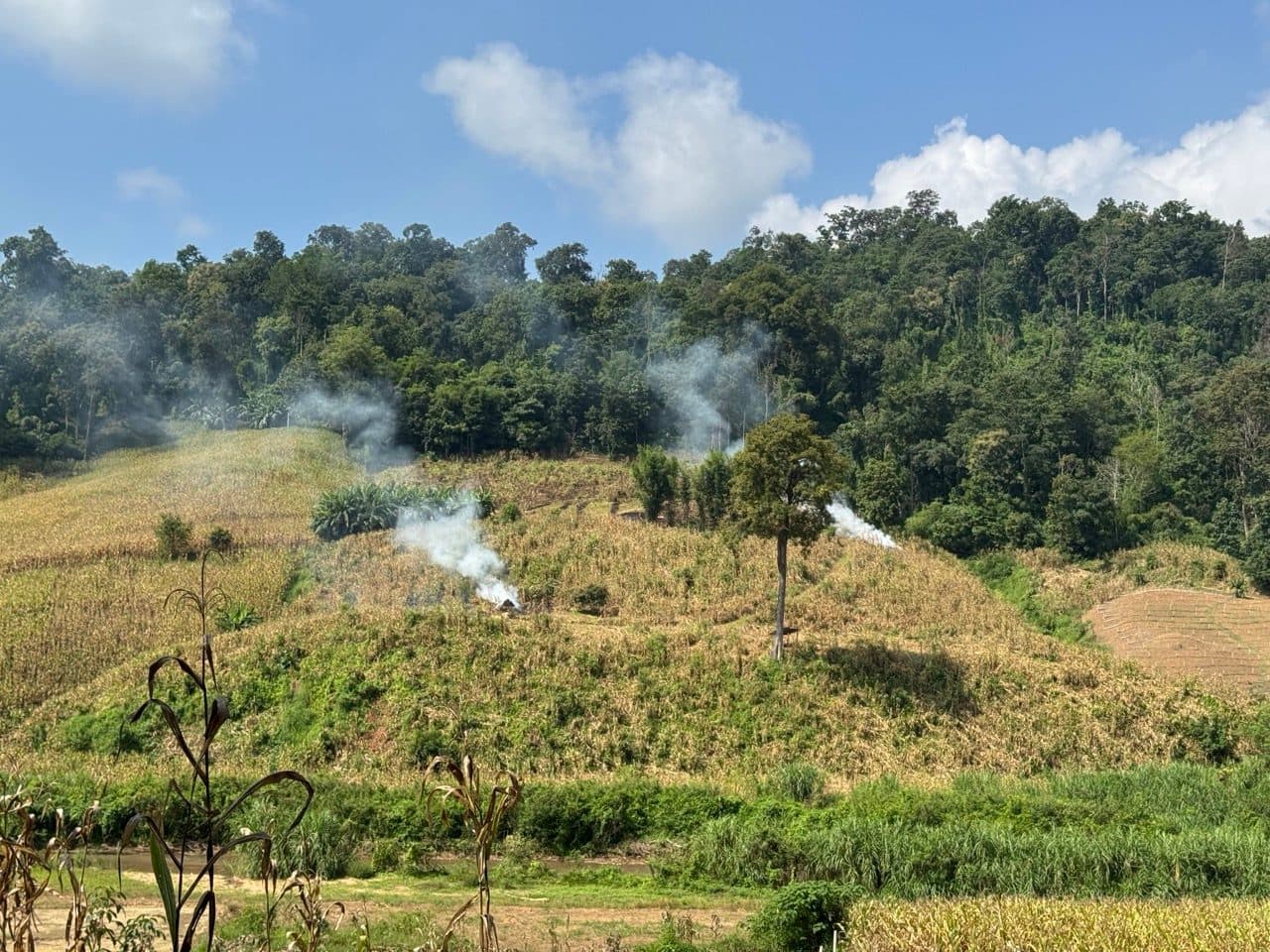 Fields being burnt off on the hillside.