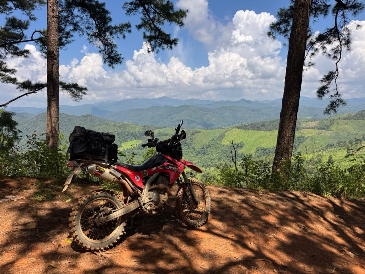 The 250 at the viewpoint, ridges running out behind.