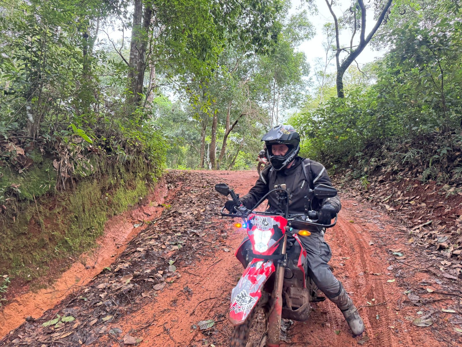 The orange clay near the top. Still damp rather than wet, and still gripping.