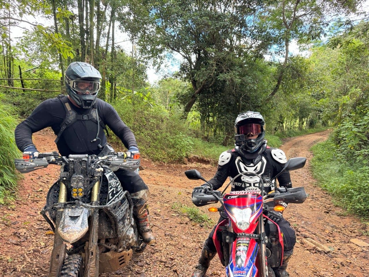 The Ténéré and a CRF300L stopped on a clay lane after lunch